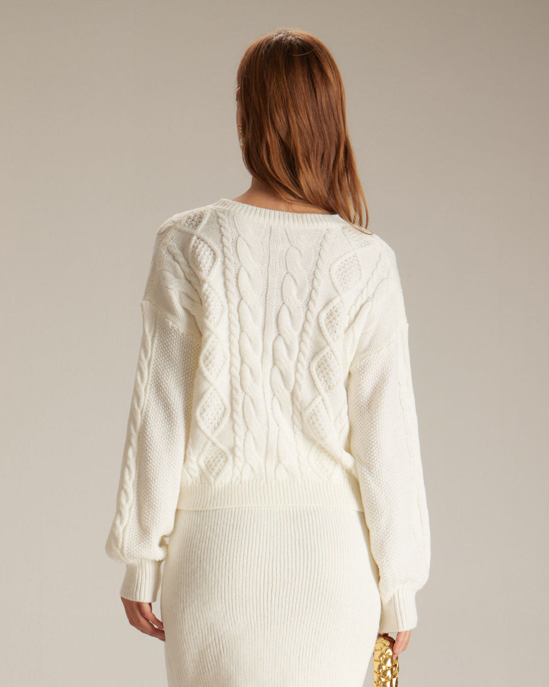 The Beige Round Neck Ribbed Cable Sweater